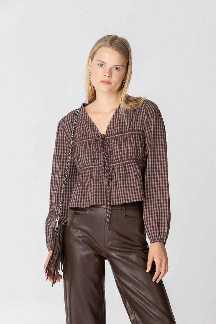 Gathered blouse with bows