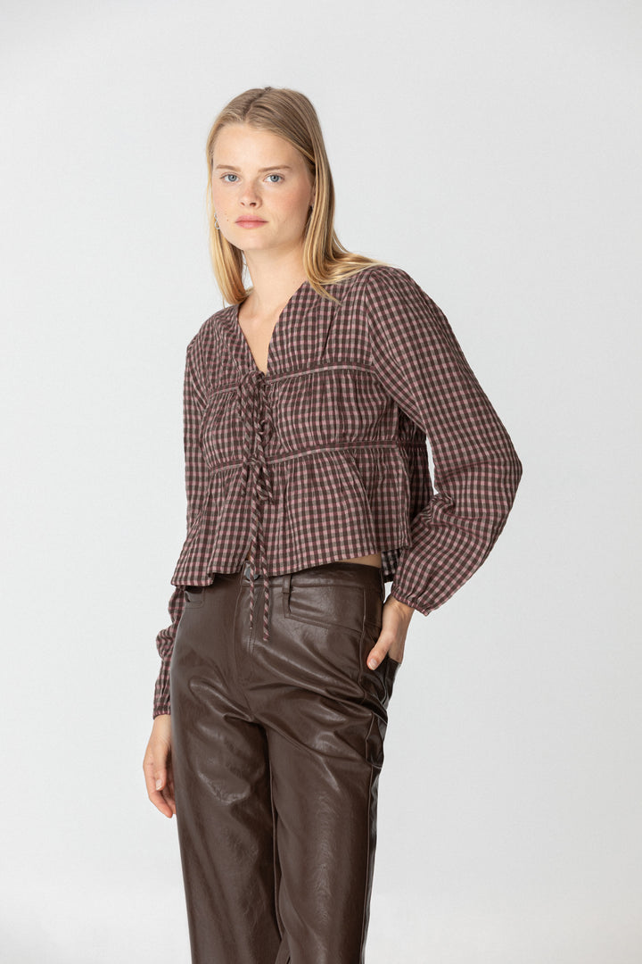 Gathered blouse with bows