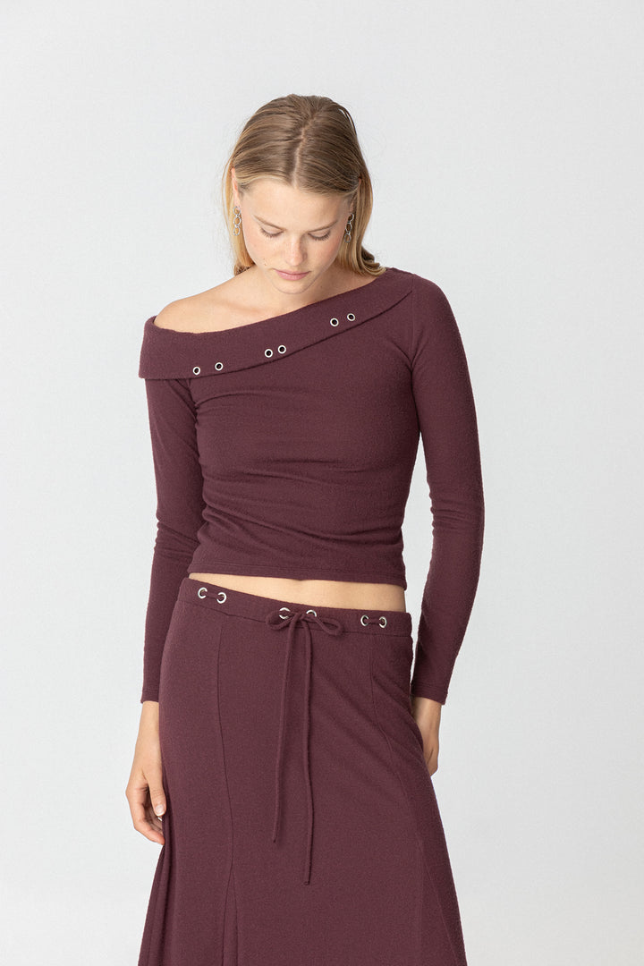 TOP ASIMETRICO EYELETS