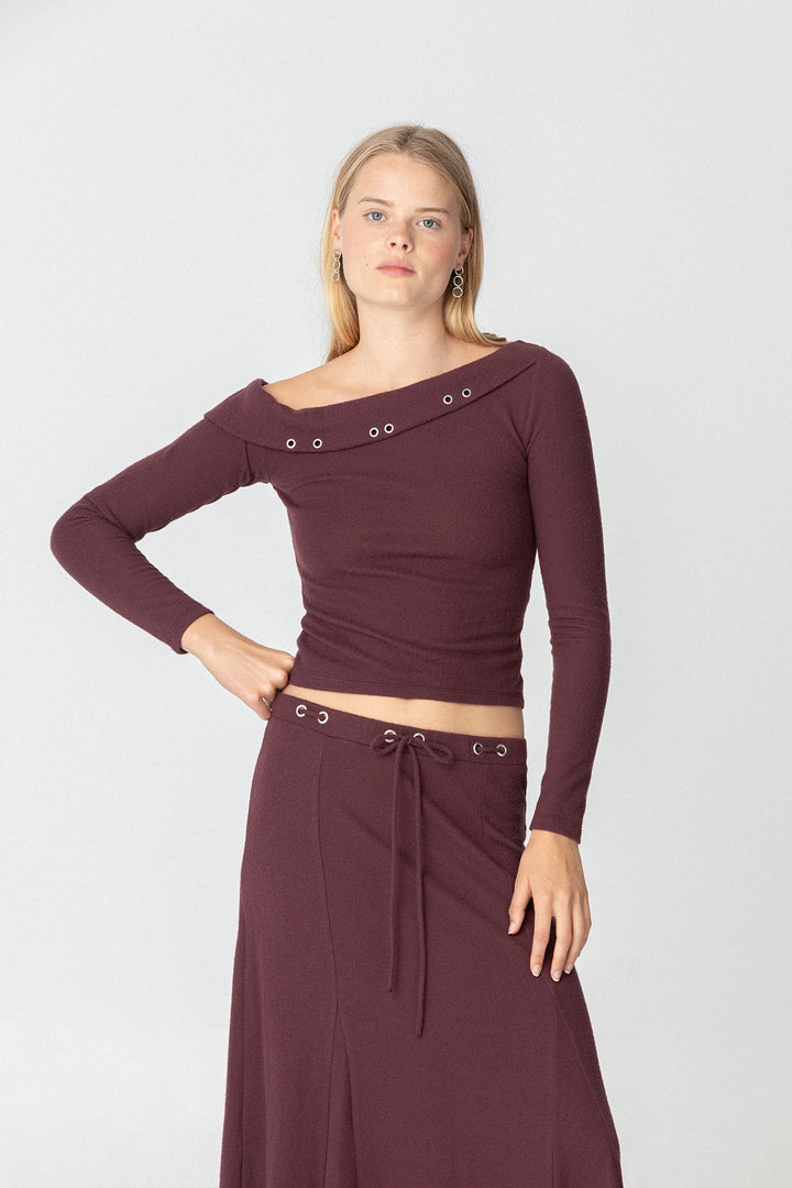 TOP ASIMETRICO EYELETS