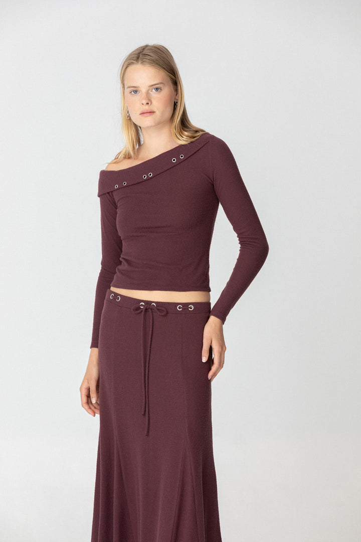 TOP ASIMETRICO EYELETS