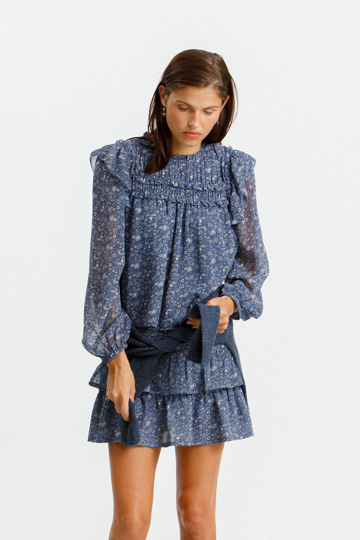 BLUSA VOLANTES ESTAMPADA