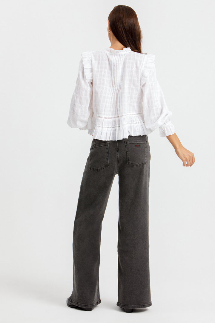 JEANS BORDADO TACHAS