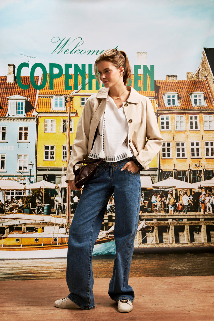 JEANS WITH EMBROIDERED YOKE AND STUDS