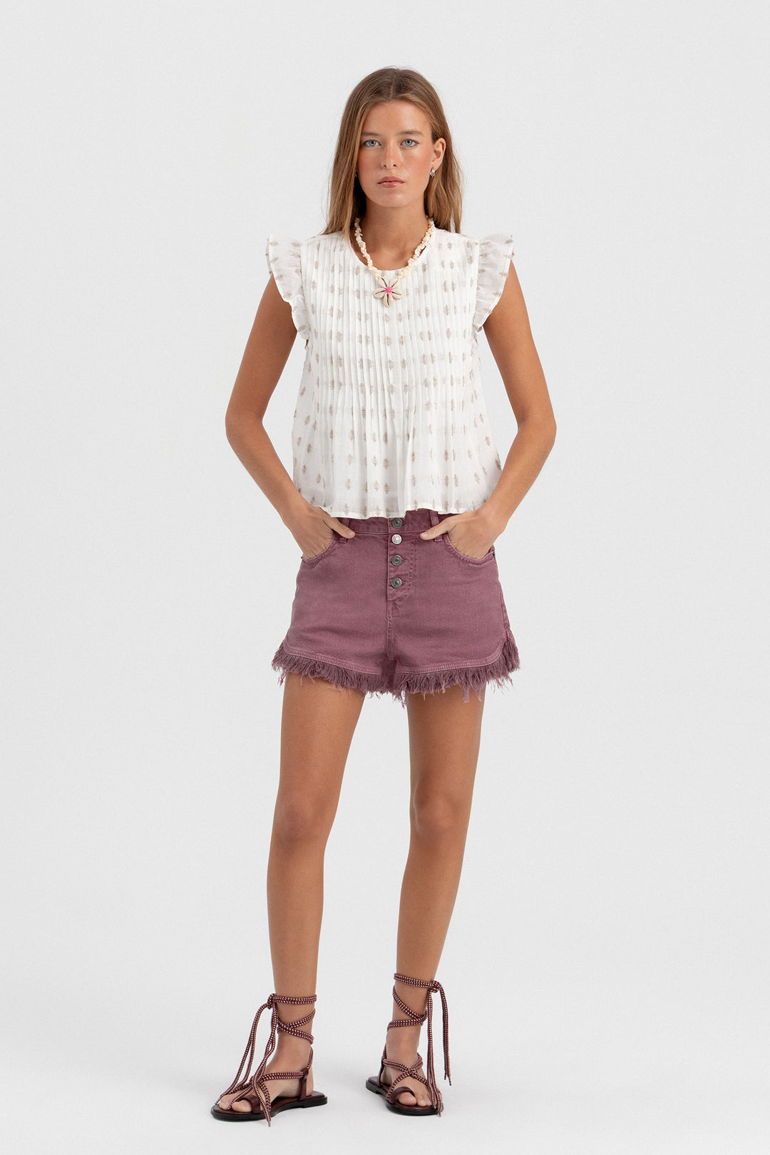 SHORTS BOTONES DESFLECADO