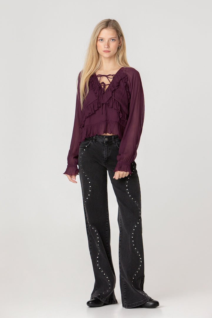 WAVE JEANS WITH STUDS