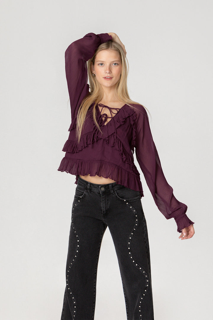 WAVE JEANS WITH STUDS