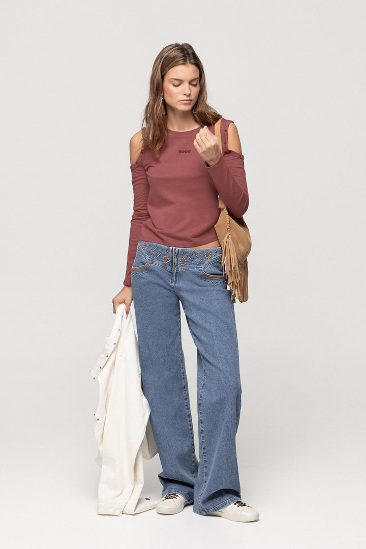 JEANS WITH EMBROIDERED YOKE AND STUDS