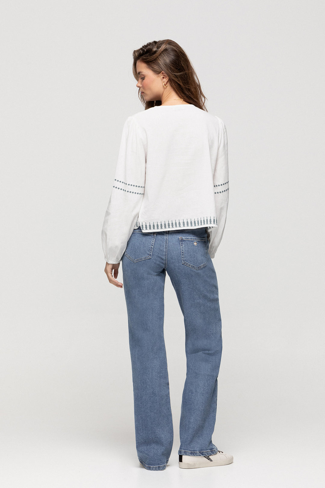 JEANS WITH EMBROIDERED YOKE AND STUDS