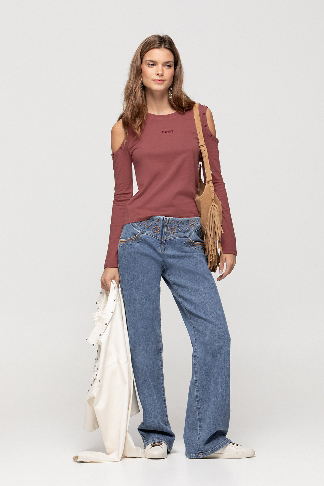 JEANS WITH EMBROIDERED YOKE AND STUDS