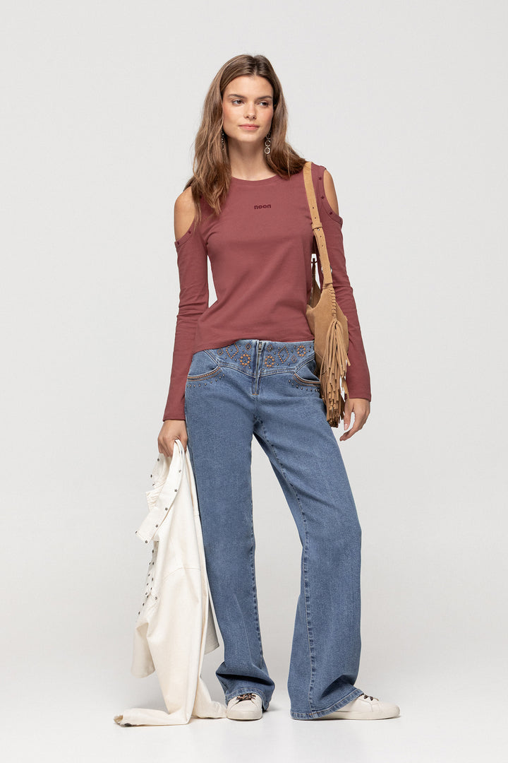 JEANS WITH EMBROIDERED YOKE AND STUDS
