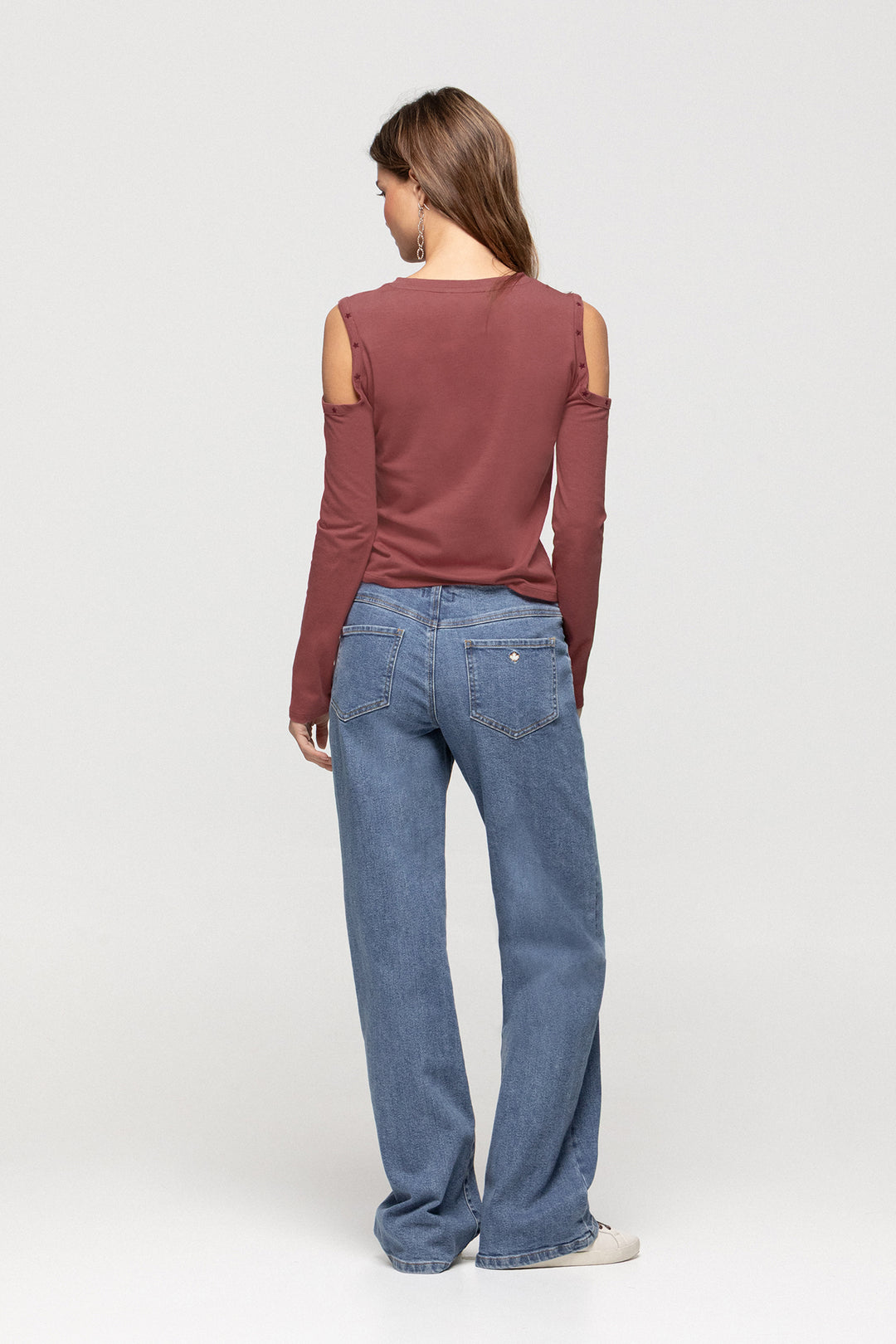 JEANS WITH EMBROIDERED YOKE AND STUDS