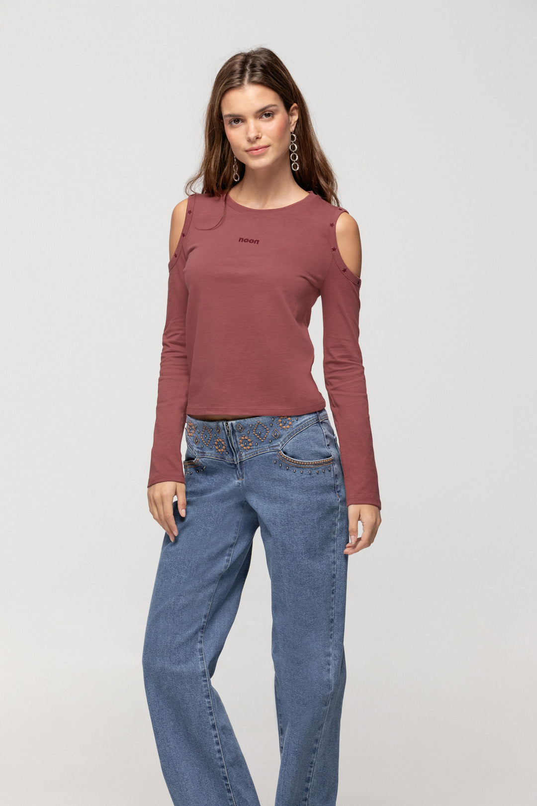 JEANS WITH EMBROIDERED YOKE AND STUDS
