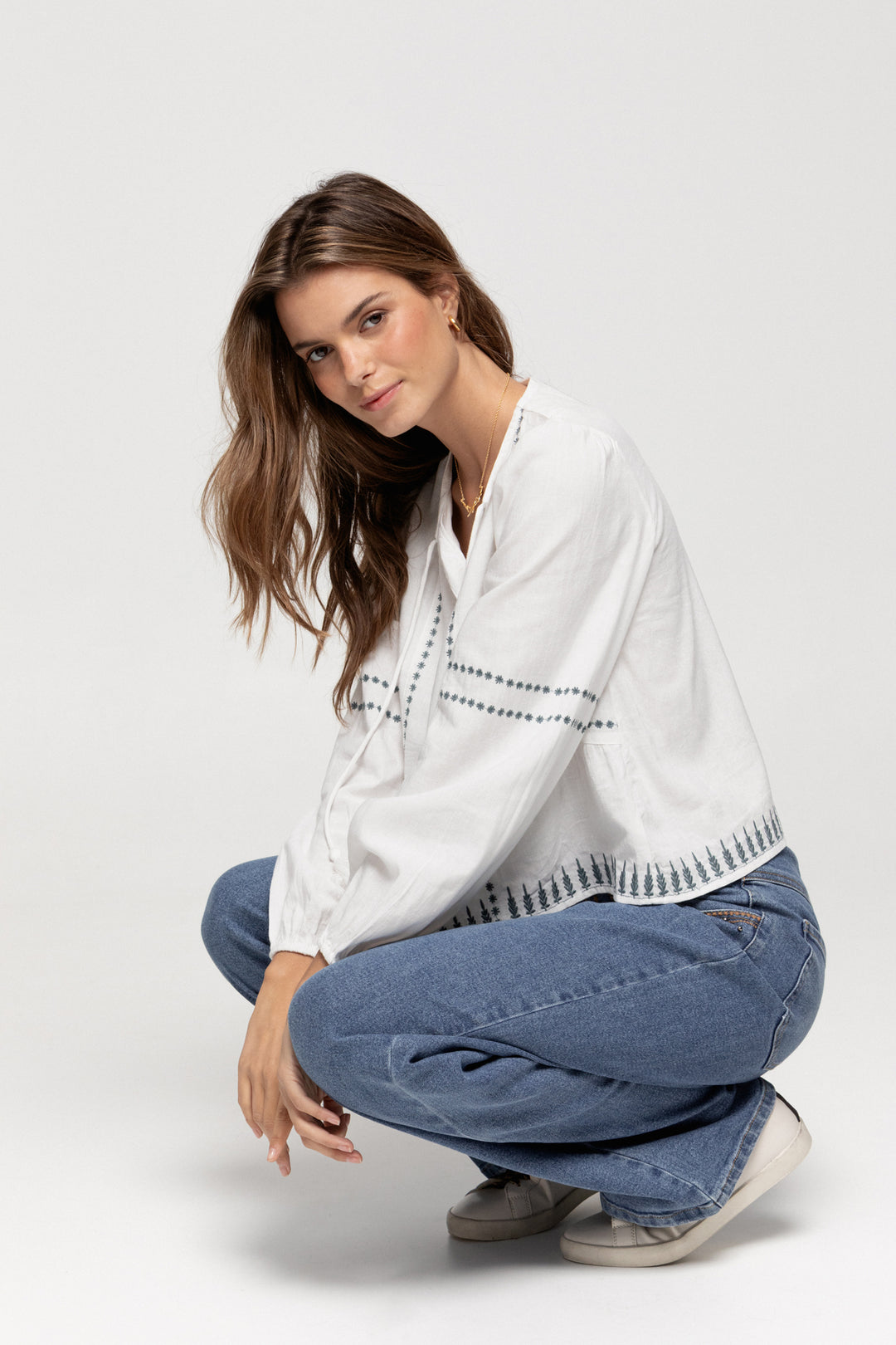 JEANS WITH EMBROIDERED YOKE AND STUDS