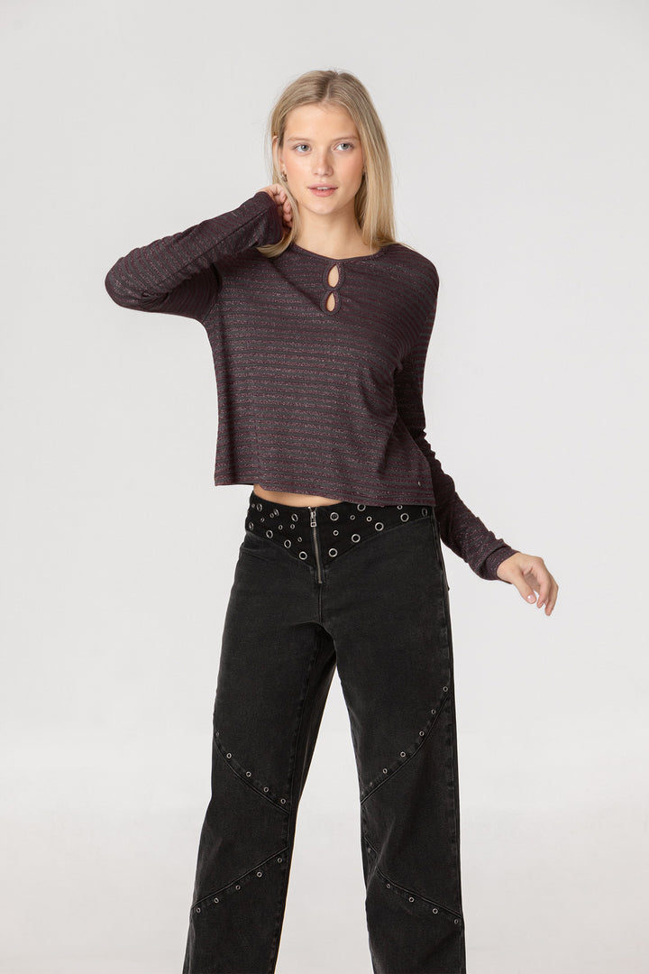 CUT-OFF JEANS WITH EYELETS STUDS