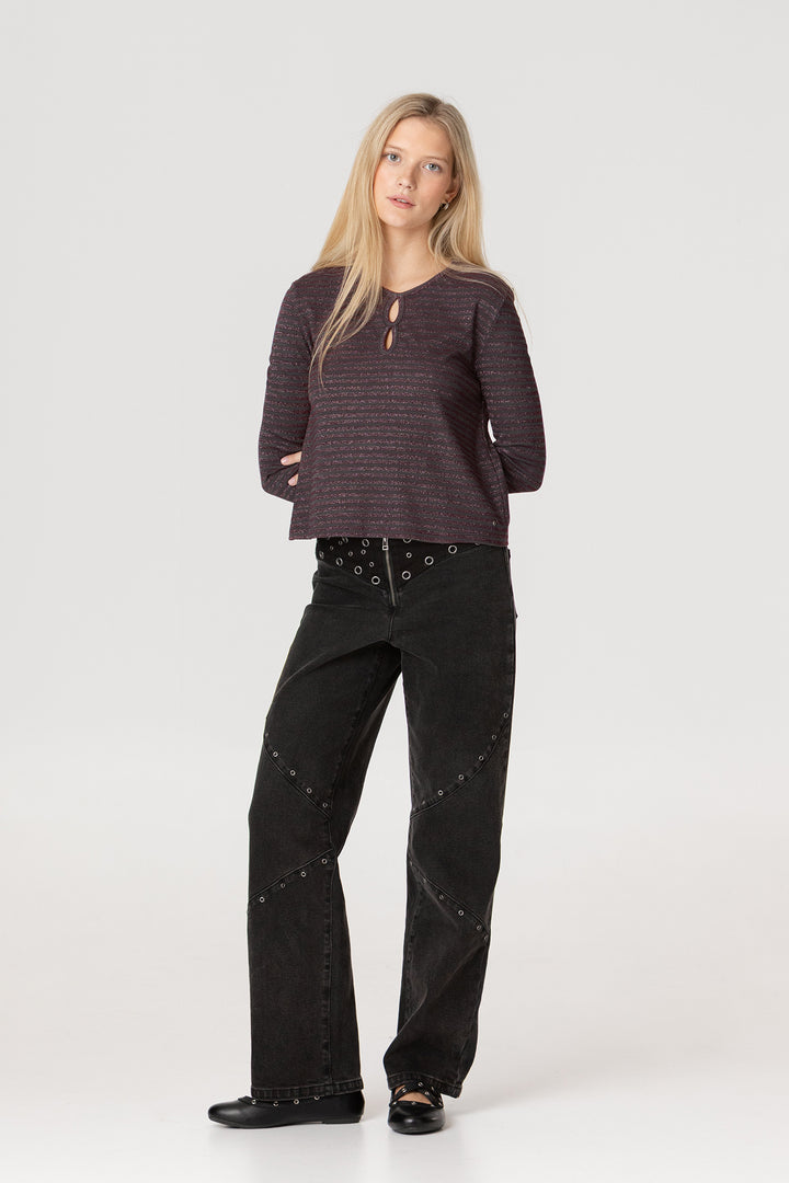 CUT-OFF JEANS WITH EYELETS STUDS