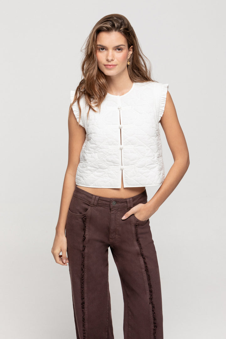 JEANS COSTURA DESFLECADA BAJO VUELTO