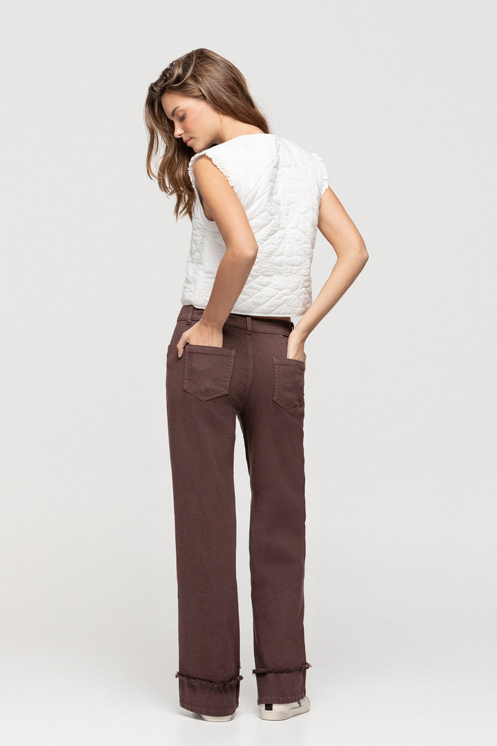 JEANS COSTURA DESFLECADA BAJO VUELTO