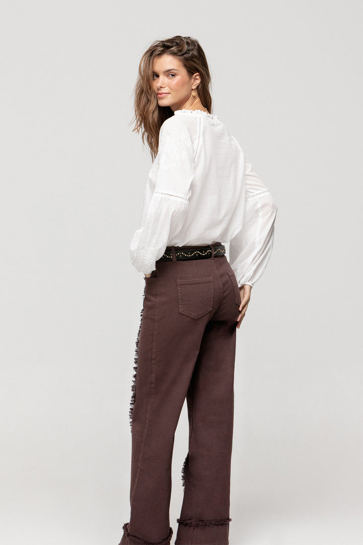 JEANS COSTURA DESFLECADA BAJO VUELTO