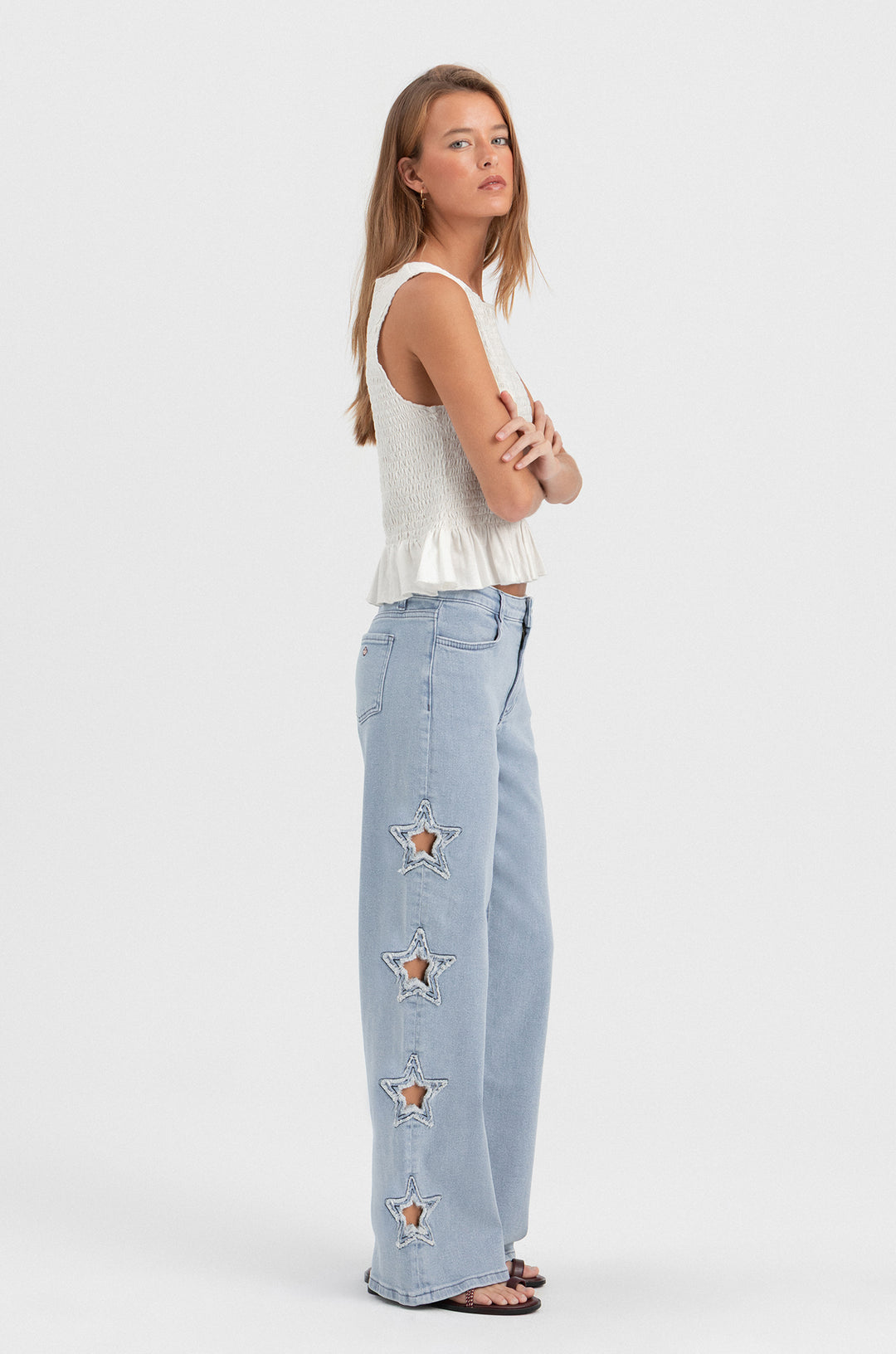 CALÇA DE GANGUE CORTADA A LASER COM ESTRELAS