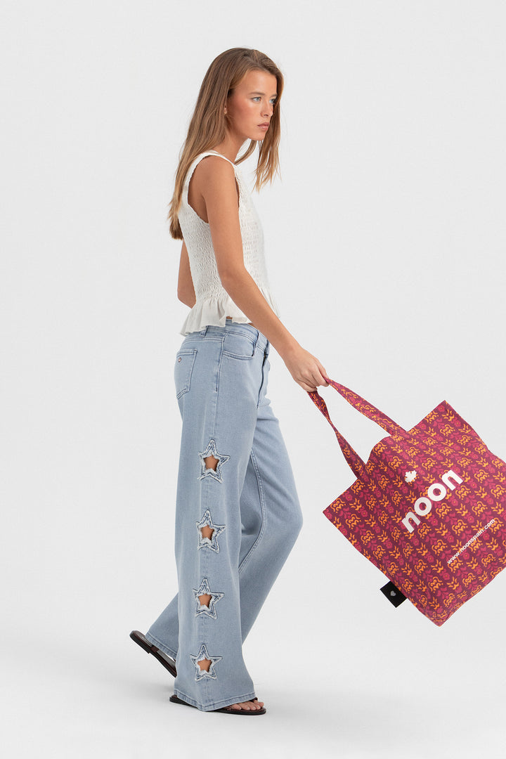 CALÇA DE GANGUE CORTADA A LASER COM ESTRELAS