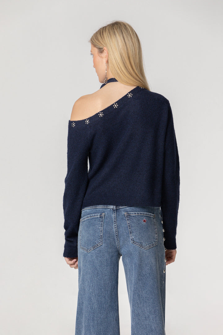 Blusa de malha com laço e tachas