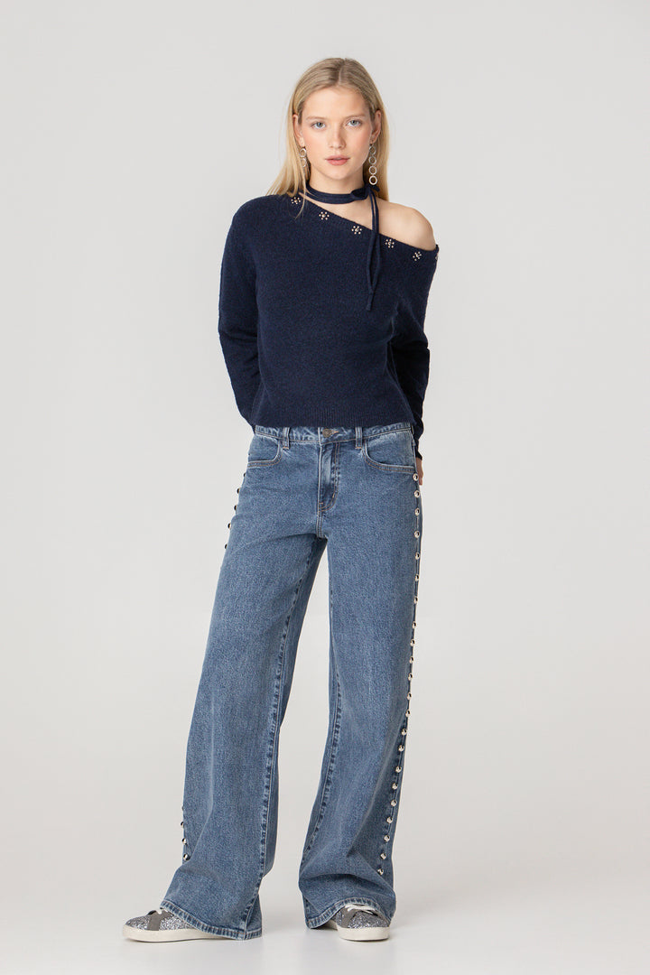 Blusa de malha com laço e tachas