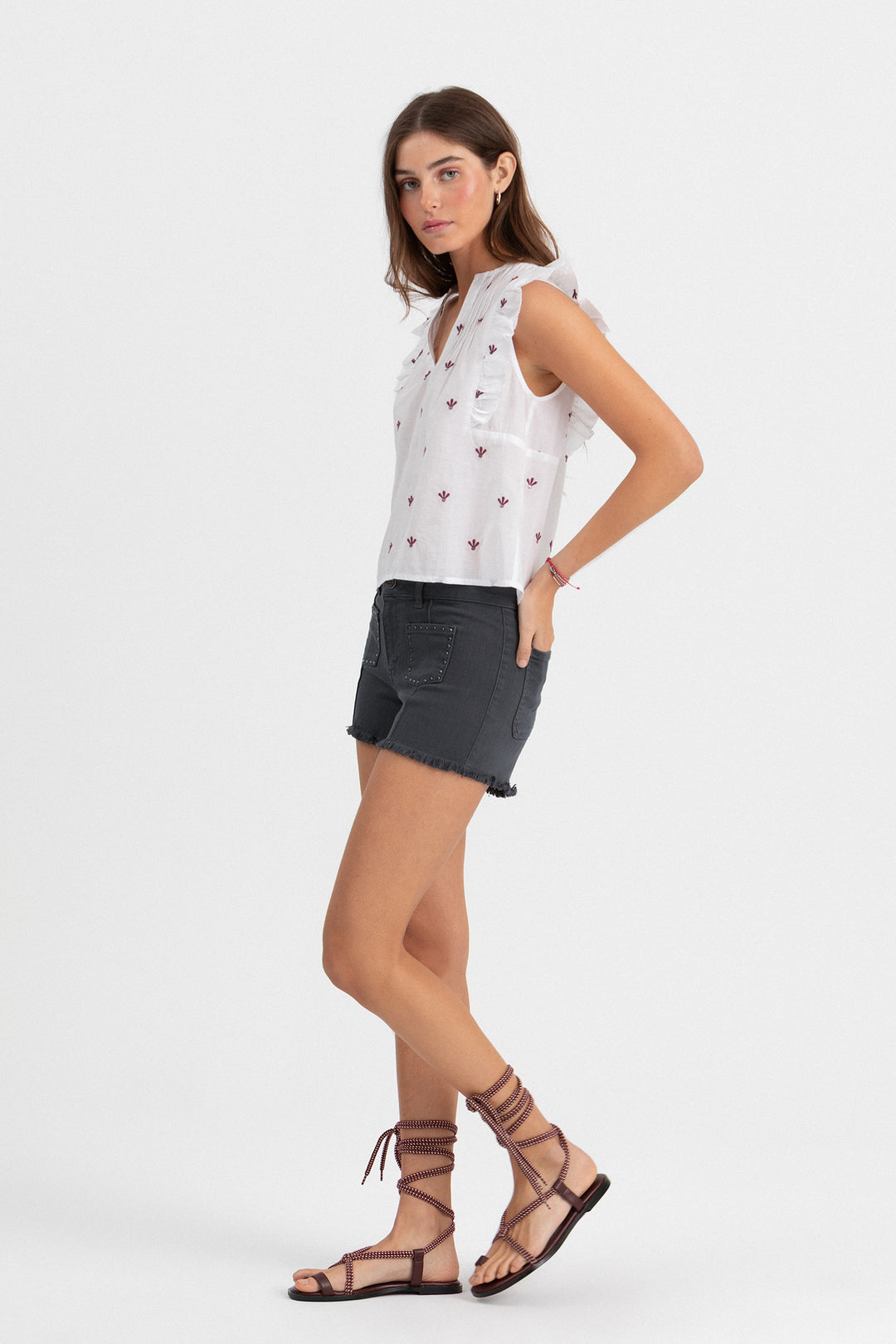 SHORTS BOLSILLO TACHAS