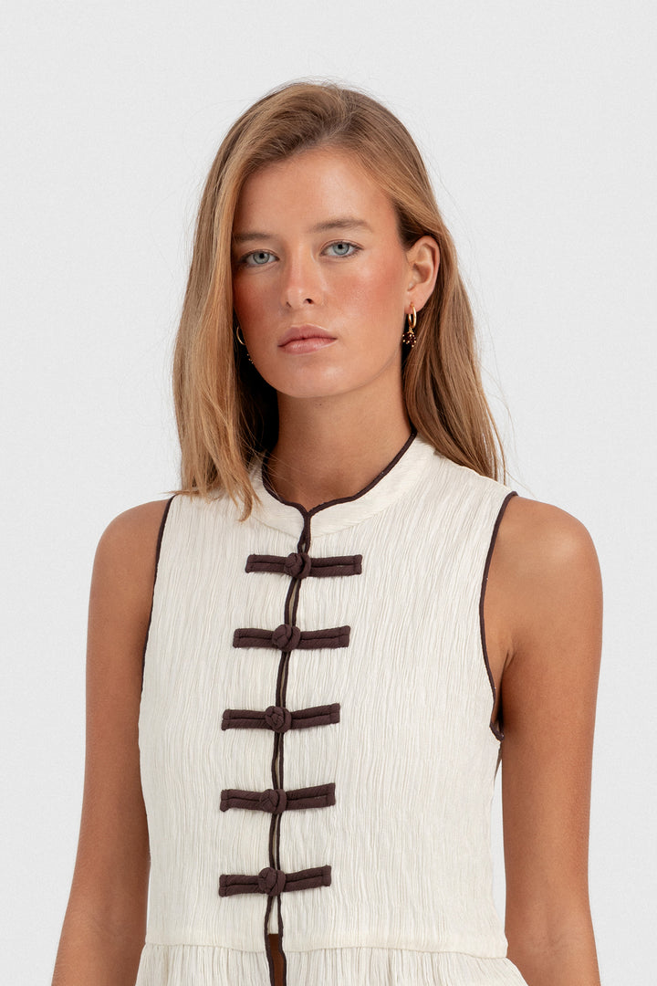 TOP CIERRES NUDO VOLANTE