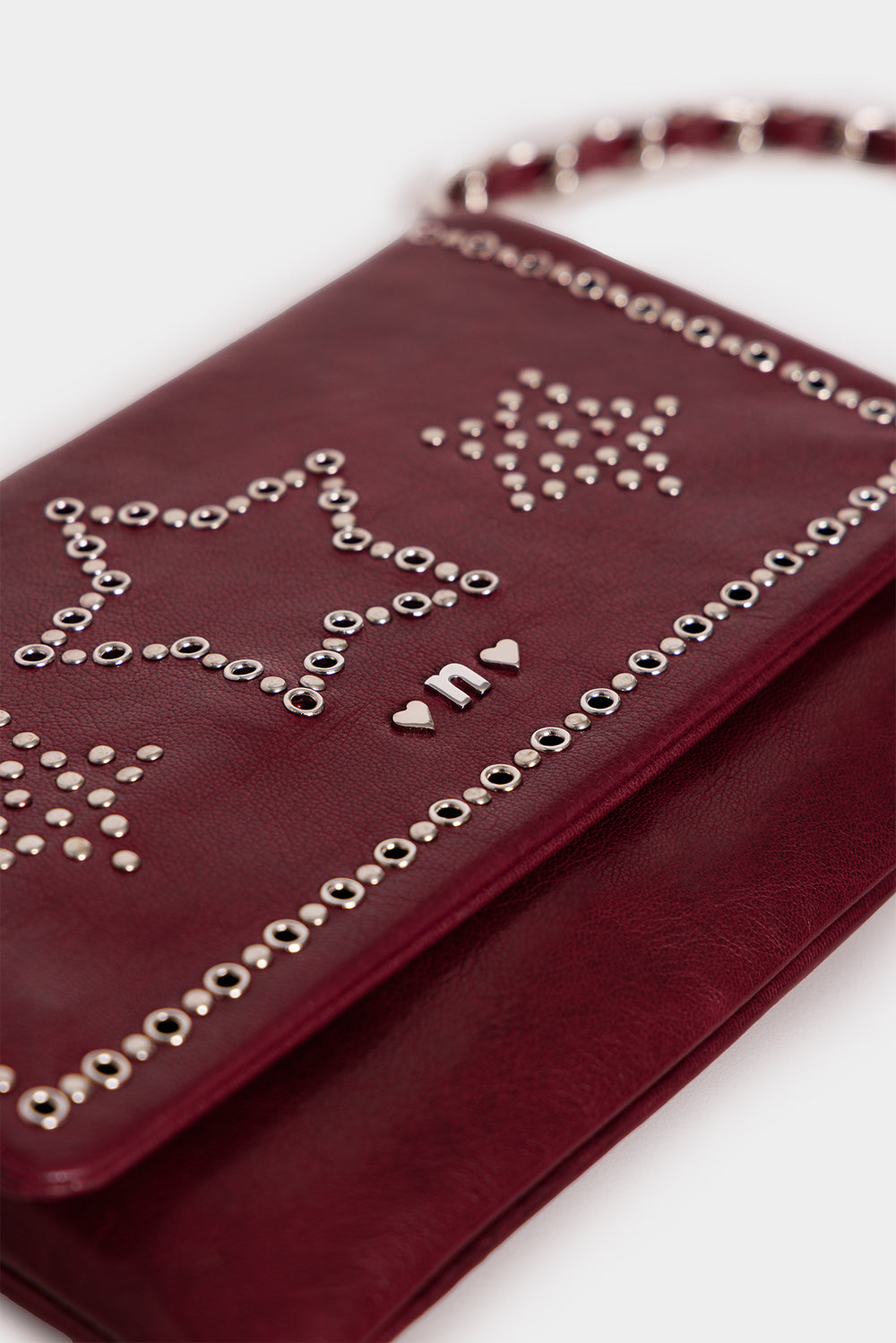 STAR EYELET CROSSBODY BAG