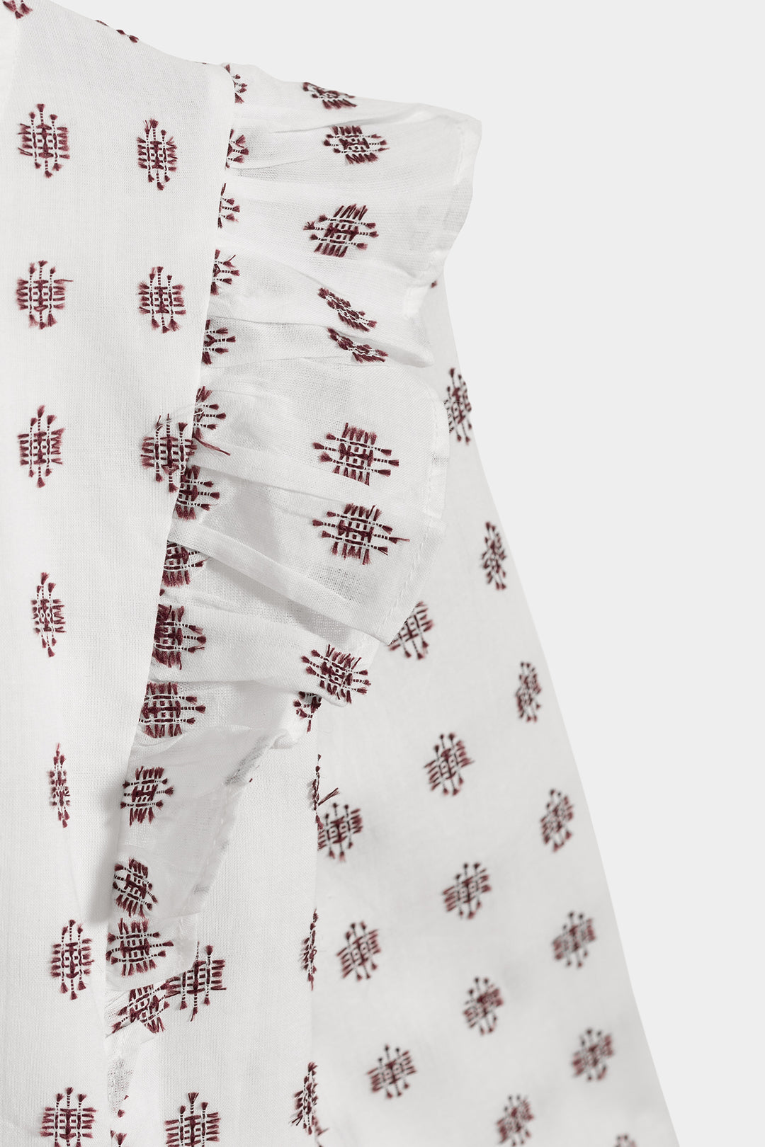 Blusa bordada com folhos