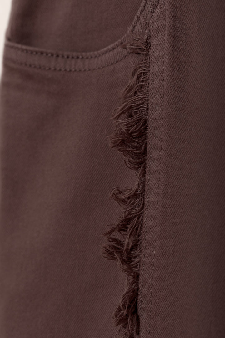 JEANS COSTURA DESFLECADA BAJO VUELTO