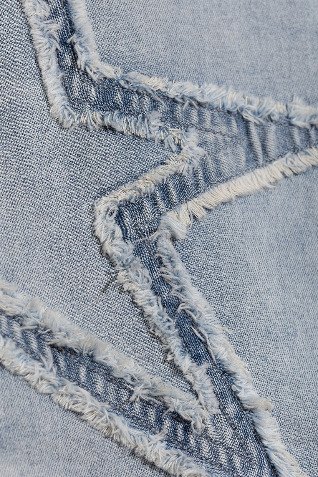 JEANS ESTRELLAS DESFLECADAS