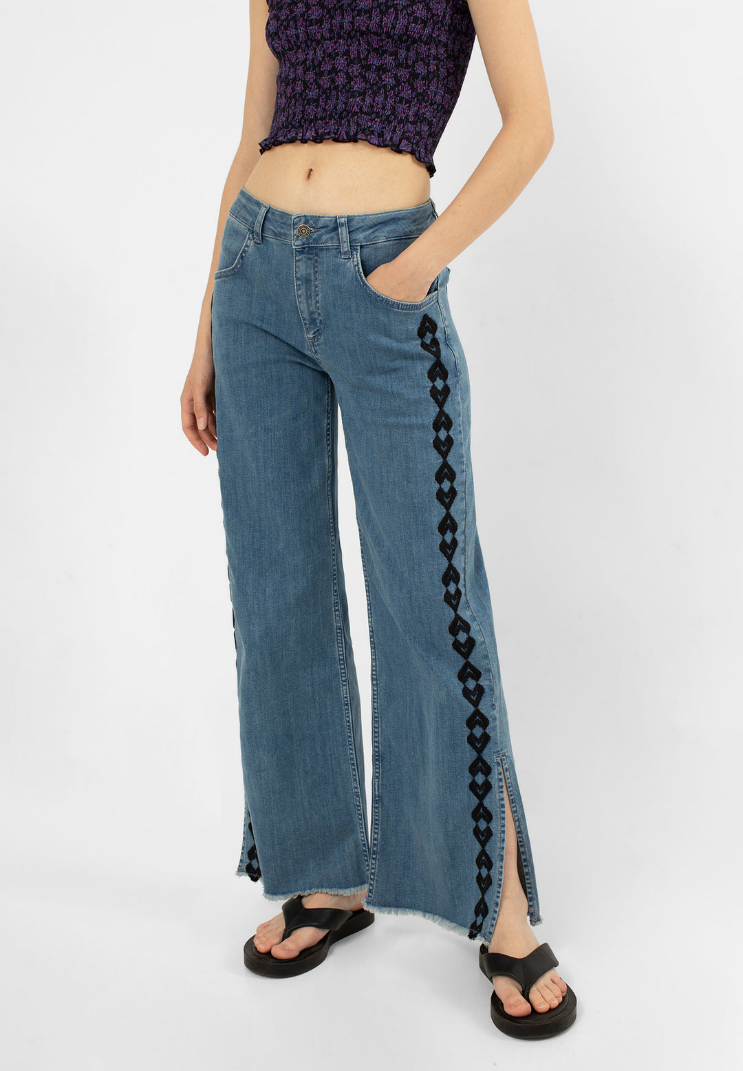 EMBROIDERED JEANS WITH OPENINGS