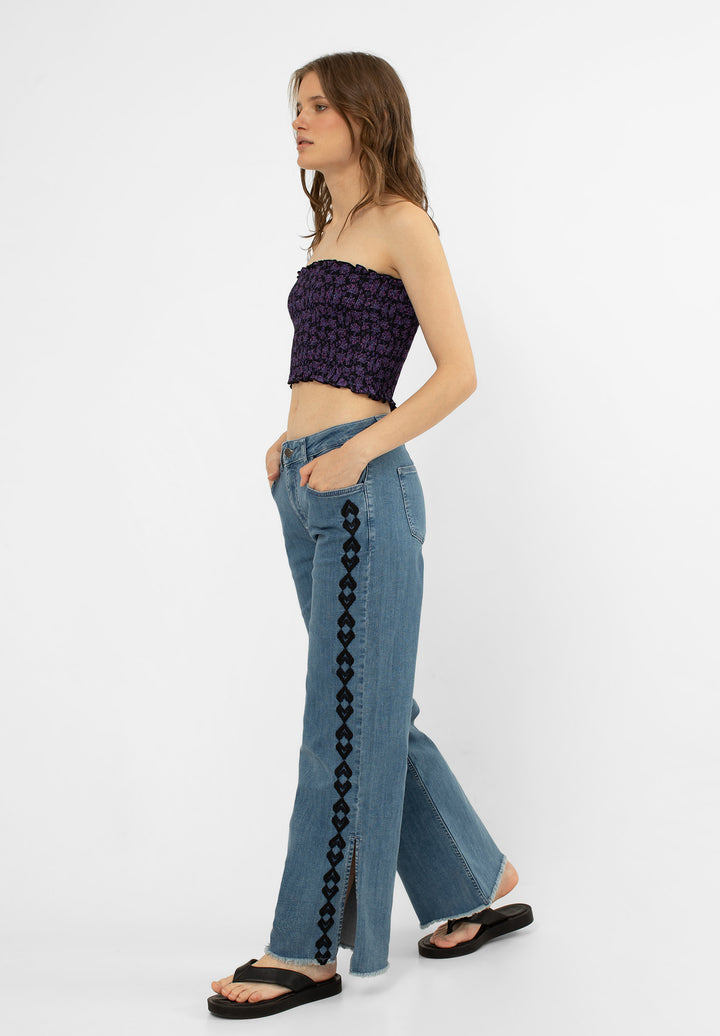 EMBROIDERED JEANS WITH OPENINGS