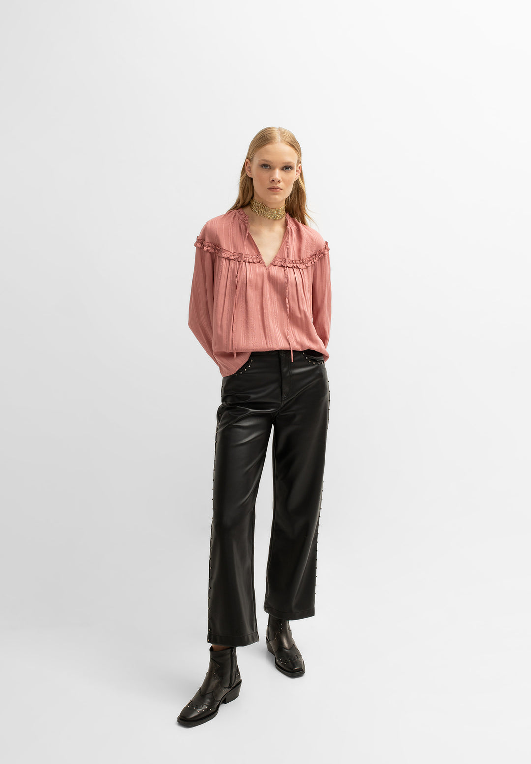 LEATHER-EFFECT STUDS TROUSERS