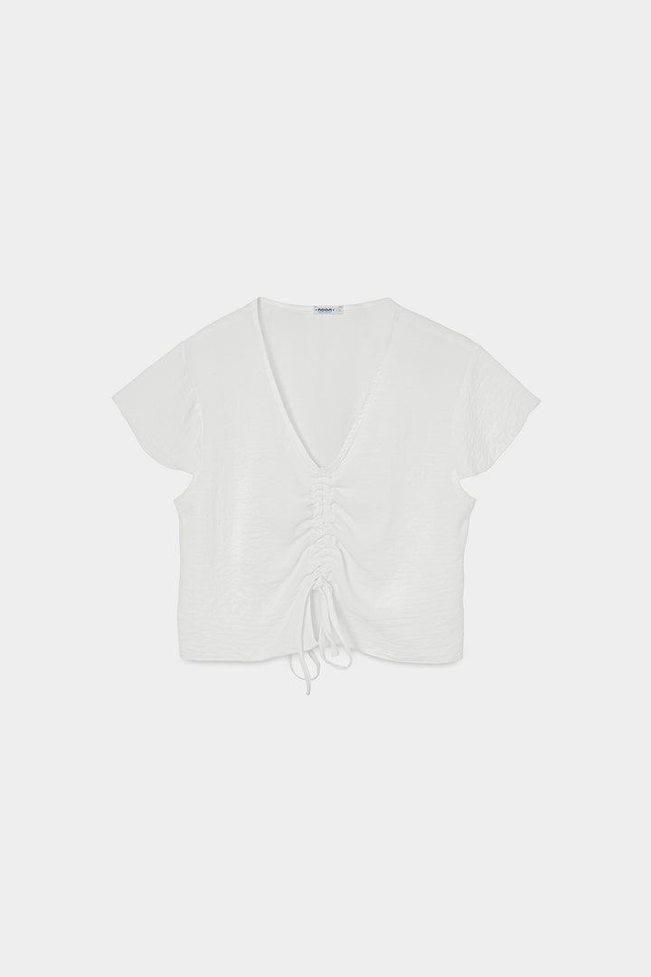 TOP FRUNCIDO ESCOTE PICO